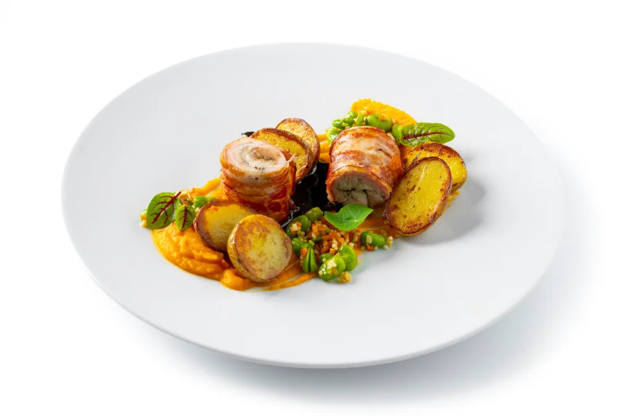 Rolled free range chicken leg wrapped in bacon