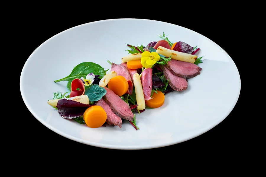 Salad with fallow deer saddle and smoked roe deer